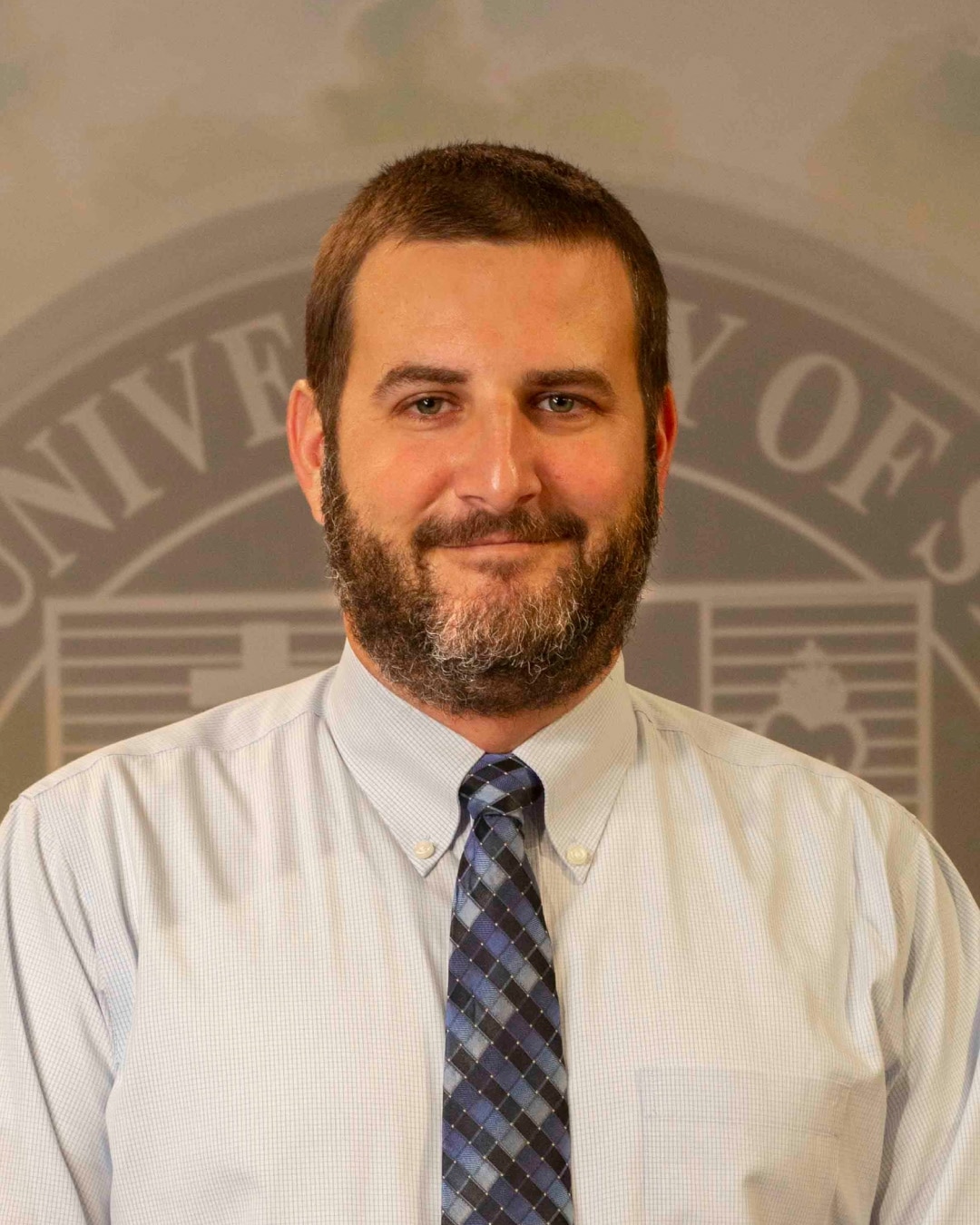 Dr. Justin Greenly